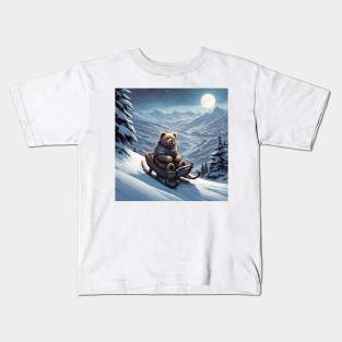 Teddy on a sledge riding down a hill in the snow Kids T-Shirt